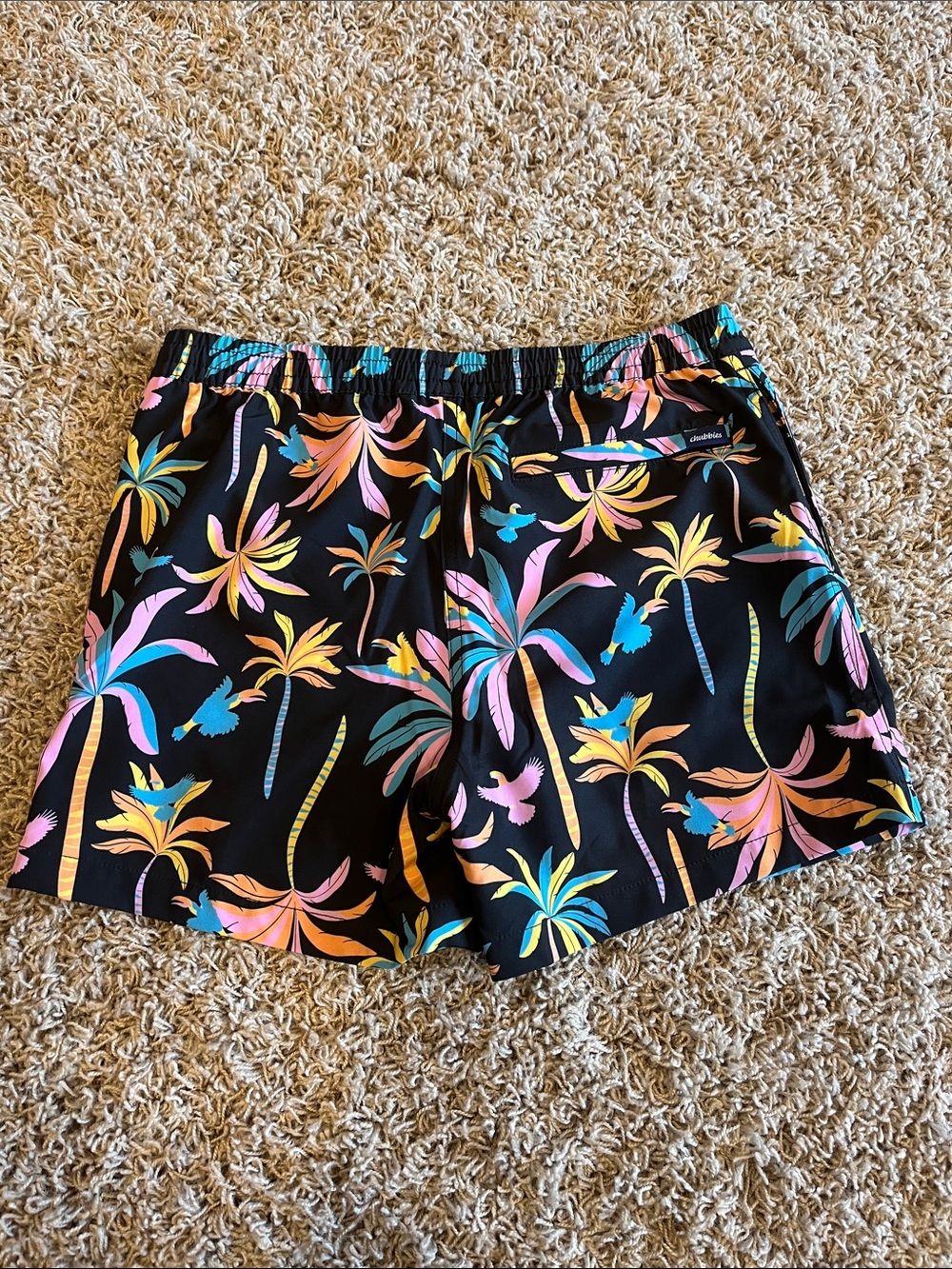 Chubbies youth large swim trunks with colorful palm tree print. - Picture 2 of 3